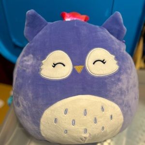 Fania The Purple Owl.  Eyes closed. Raindrop like pattern on bottom front.